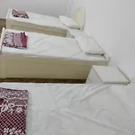 شقة غرفتين وصاله ومطبخ وحمامين 10 دق للحرم